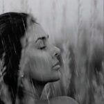 Lisa Ray Instagram - Posted @withregram • @brycesmom.310 **sound on** The rain is falling without philosophy without etiquette to stir melancholy in the people on the pavement below. I think only of the scent of persistence and the metallic wet crowd pressing on like pigeons Step Dip Lift soap bubbles on the footpath who lowers and who raises and when to surrender? Because there is not room enough in this obsidian city for two umbrellas to walk at equal height Standing at the curb heart sluice open while I a warden of damp watch pelting after thoughts tucked into tiny handbags while I like a foreigner arrived bloat into Byzantine blue then erupt quietly in the rain. — @lisaraniray Image @rohitchawlaphotography_ #LisaRay #LisaRaniRay @protestpoet #poetry #rain #rainfall #womenauthors #writersofinstagram #writer #inspire #poems #poemsofinstagram