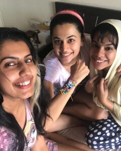 Taapsee Pannu Instagram - The day I forced these 2 to tie rakhi to me coz after all raksha toh main bhi kar rahi hu na 💁🏻‍♀️
The perks of being the eldest sibling  are, you have the minions to get you the remote , water and also to crush n cuddle ❤️🤗🤗🤗🤗
#Throwback #Archive #QuarantinePost