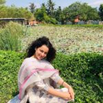 Kangana Ranaut Instagram - #KanganaRanaut during the golden hour, posing next to the lotus pond at Isha Yoga Centre in Coimbatore. She can be seen in a simple attire which signifies the clarity and peace in her mind post yoga-session. Isha Yoga Center