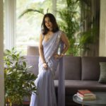 Nisha Agarwal Instagram – Wedding vibes ❤️ love love love this saree/saree gown from @shlokakhialaniofficial right from the ruffles, the ease of the predrape and the stunning color. The color happens to be the @pantone color of the year 2022 #periwinkle 

Swipe to see a detailed shot of the stunning jewelry all from @umraojewels 

Styled by @shikhadhandhia 
MUAH @khush.mua 
📸 @piyush_tanpure 

#grwm #indianfestivewear #sareestyle #predrapedsaree #indiandesigners #weddingwearsarees
