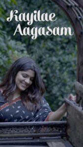 Aparna Balamurali Instagram - Extremely happy to share my new cover song, Kayilae Aagasam from Soorarai Pottru.
Also starting my very own YouTube channel❤️

This was possible only coz of a bunch of extraordinary talents. From my dad who arranged the background music to each and everyone who took the effort to make such a beautiful video. 

Keyboard: @amith.sajan 
Flute: @sanwin_jenil 
Mix and master: @saji4862 

Video credits
DOP : @i_harirs 
Stills: @pournami_mukesh_photography 
Editing: @rahultb_rtb 
Art: @art_d_jibpzie 

Saree and accessories from my most favourite @anastoriesonline 
❤️

Also thanking @stayrainforest for letting us shoot in their amazing property with a breathtaking view of the Athirappilly waterfalls ❤️
Do check the Link in my bio!