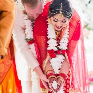 Richa Gangopadhyay Instagram - Remembering our beautiful, waterfront Indian ceremony that took place on this day, last year, and how special it was for our families to come together as Joe and I completed our Hindu Bengali rituals together (Joe is a master at reciting mantras, nbd). We were lucky to have been able to honor both our cultures and traditions and to have Joe’s family embrace, and enthusiastically participate in every nuanced element of our celebrations with open arms. ⁣⁣
⁣⁣
From the “gaye holud” (haldi/turmeric ceremony), to the “ayeburobhaat” (bride-to-be’s final luncheon with her favorite dishes), “totto” (or tatwa, groom welcomes the bride to their family) and “bor boron” (bride’s mother and female friends welcome the groom), each distinctive event bonded us closer, for life.🔒♾️⁣⁣
⁣⁣
I can’t even put into words how utterly grateful I am, and always will be, to my parents for giving their only daughter a wedding that dreams are made of. To have our extended family and friends from all over celebrate our union over the three-day wedding events was indescribable, and on our anniversary, revisiting over 3000 photos brings us back to the fun, laughter, tears of joy (and yes, of course a little bit of chaos…it’s a fusion wedding!). 🥳⁣⁣
⁣⁣
We are blessed beyond words, for having each other and for having our families love and support us till the very end. We love you Ma, Baba, Deb and Steve!🥰⁣⁣
⁣
Venue: @roostertail
Makeup: @jhobby21 
Hair: @hairbyaysha 
📷: @kelliesaunders