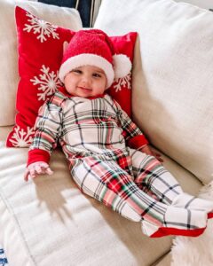 Richa Gangopadhyay Instagram - Merry Christmas from our little family to yours! 🎄

Luca had a pretty darn good first Christmas (and got alllll the presents!) 🎅🏻

Wishing you all a joyous holiday season and happy 2022! ✨

#merrychristmas #christmaspajamas #christmasjammies #familytime #alliwantforchristmasisyou #happyholidays #lovemyfamily