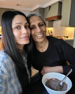 Freida Pinto Instagram - My mom and I with her famous Ragi Porridge for postpartum healing. This is one of my favorite recipes that I have enjoyed these past few months. Ragi is a staple for postpartum healing in India because it is rich in calcium and iron and the amino acid tryptophan which is great for the nervous system. And it’s absolutely delicious. 

I’m so grateful to my mother who has moved in with me these past few months to care for me while I care for Rumi-Ray. ❤️

Sharing the recipe on @thisis.anya today!
