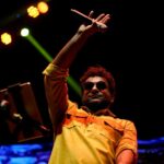 Haricharan Instagram - Felt Sooooo good to be Back on Stage with my Band. Thanks to the wonderful audience for Singing along 😍😍 Last Night at Thiruvananthapuram for the Inauguration of @keralaolympic Pics by @ebysolickal University Stadium