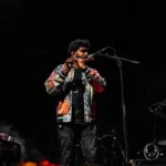 Haricharan Instagram - Felt Sooooo good to be Back on Stage with my Band. Thanks to the wonderful audience for Singing along 😍😍 Last Night at Thiruvananthapuram for the Inauguration of @keralaolympic Pics by @ebysolickal University Stadium