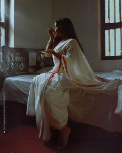 Rajisha Vijayan Instagram - The sun came and landed a kiss on her forehead
She leaned in, slowly tracing it with her ringfinger
And found a big bright red dot right there
The souvenir, her crimson love stayed etched until the next morning.. ♥️