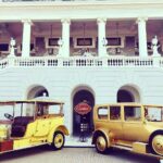 Anveshi Jain Instagram - Exactly this ! Where I look too small in front of my castle and collection of vintage cars ! # majorthrowback#cartier #cartiertravelshow