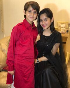 Jannat Zubair Rahmani Instagram - Happy Raksha Bandhan❤️ Wearing:- @sewbery P.S- Don’t mind my sick face!!