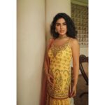 Samyuktha Menon Instagram - ✨Amber Blooms ✨ To work with the true pioneers of taking Indian fashion, patterns and fabric global was an absolute honour ✨ - @ritukumarhq @ri_ritukumar and @tanishq jewellery - The dashing, couture KESARI Collection of RI , Ritu Kumar Design looked like a dream paired with Tanishqs line that is all about celebrating yourself, the SWAYAHM collection. The simple and classy bangles hugging my wrists is from the AARAMBH collection. Styling and Concept: @swetha_chiku ❤ Brand Business Associate [Tanishq] : @govindrajkamath 💙 MUA : @unnips - your dewy and glowy makeup and the beach waves just completed the look ❤️ Photography : @vaffara_ Location : @chittoorkottaram_cghearth, laid back aesthetics on the banks of Cochin Backwaters ☀️ Media branding : @reeltribe 😎 #heritage #culture #tradition #ritukumar #tanishq #unnips #vaffara #chittoorkottaram #aarambh #kesari #collection #photoshoot #lookbook #yellow #playful #samoninsta #grace #swayam #contemporary #kochi #godsowncountry #newlook #ritukumarfashion #samfam #strength #beauty #kottaram #royalty #cochin Chittoor Kottaram
