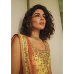 Samyuktha Menon Instagram - ✨Amber Blooms ✨ To work with the true pioneers of taking Indian fashion, patterns and fabric global was an absolute honour ✨ - @ritukumarhq @ri_ritukumar and @tanishq jewellery - The dashing, couture KESARI Collection of RI , Ritu Kumar Design looked like a dream paired with Tanishqs line that is all about celebrating yourself, the SWAYAHM collection. The simple and classy bangles hugging my wrists is from the AARAMBH collection. Styling and Concept: @swetha_chiku ❤ Brand Business Associate [Tanishq] : @govindrajkamath 💙 MUA : @unnips - your dewy and glowy makeup and the beach waves just completed the look ❤️ Photography : @vaffara_ Location : @chittoorkottaram_cghearth, laid back aesthetics on the banks of Cochin Backwaters ☀️ Media branding : @reeltribe 😎 #heritage #culture #tradition #ritukumar #tanishq #unnips #vaffara #chittoorkottaram #aarambh #kesari #collection #photoshoot #lookbook #yellow #playful #samoninsta #grace #swayam #contemporary #kochi #godsowncountry #newlook #ritukumarfashion #samfam #strength #beauty #kottaram #royalty #cochin Chittoor Kottaram