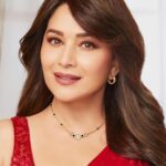 Madhuri Dixit Instagram - Adorning The @bulgari Mangalsutra - An Icon That Symbolizes Eternal Love. #HappyKarwachauth❤️❤️❤️ #Bulgari #BulgariMangalsutra #BulgariJewelry #Bzero1 #collab