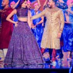 Nora Fatehi Instagram - Performing Arabic Dilbar on stage with @fnaire_official for the annual Caftan 2019 @2mtv Live! It was a pleasure to perform and sing wearing this gorgeous Lehenga by @shantanunikhil on a bollywood themed act in Morocco 🇲🇦🇮🇳 Outfit @shantanunikhil Hair and makeup @marcepedrozo Photographer @mohamedsaadstudio ———————————————— @tizafmohcine @mennani_khalifa @achrafaarab1 @amine_el_hannaoui @bassimbendell @femmesdumaroc_officiel @funandyz