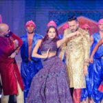 Nora Fatehi Instagram - Performing Arabic Dilbar on stage with @fnaire_official for the annual Caftan 2019 @2mtv Live! It was a pleasure to perform and sing wearing this gorgeous Lehenga by @shantanunikhil on a bollywood themed act in Morocco 🇲🇦🇮🇳 Outfit @shantanunikhil Hair and makeup @marcepedrozo Photographer @mohamedsaadstudio ———————————————— @tizafmohcine @mennani_khalifa @achrafaarab1 @amine_el_hannaoui @bassimbendell @femmesdumaroc_officiel @funandyz