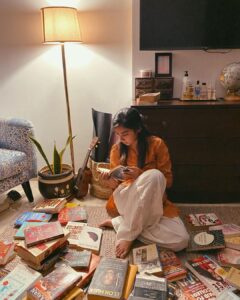 Prajakta Koli Instagram - Day 10 of #SelfQuarantine : I have a habit of marking every line, every page that moves me in every book that I read. Sat down and re-read all those lines and pages today. ♥️📚 #Hmm