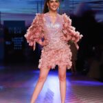 Sanjana Sanghi Instagram - My debut runway moment at @lakmefashionwk x @fdciofficial . Back in my hometown, Dilli. Adorning this holographic pastel lover’s dream by the most special @pankajandnidhi 💗- showcasing their most stunning collection “Marbella” A confluence of so many special moments. As a child of the stage, to get to be back on it, is an instant reminder that the exhilaration it comes with is absolute 🔥🔥 Fam & friends, thank you for coming out and celebrating this in the grandest way possible. My team, you guys are ♥️🌏 And to the epic Quirks of the town, @varunpratap_ @somyagoenka_ @quirk_india The runway bug may just have bitten hard. 🥰