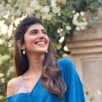 Sanjana Sanghi Instagram - Work takes me to Goa, enough said. 🎥 🌴☀️ . . Photo Number 2 is the shock and joy of the cutest doggo turning up out of nowhere on set.🥺 (Also - imperfect, uninhibited laughter is clearly becoming a permanent Sanj+Goa feature)
