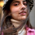Sanjana Sanghi Instagram - • The Insatiable Wanderer • A PhotoSeries by @tarishiguptaa created in the chilly February winds & fast setting sun of New York City / 📍: Chinatown, Manhattan, New York. • We chose to celebrate art, and womanhood. Art, that magical element we artists are blessed to dedicate our lives to. That throws you onto the most unimaginable journeys of new & beautiful places, people and discoveries. Journeys that feed your soul. Some of my time in New York was spent collaborating with some amazing female artists from all around the world revelling in #ThePowerOfWomanhood #AllyUpForHer Makeup by : @madeup_looks 🎩 & 👖: @urbanoutfitters • 🧥: @scotch_soda Chinatown, Lower Manhattan