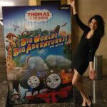 Tina Desai Instagram - Ha!! Never expected to pose beside a standee of a Thomas film, let alone one I've worked on, until I found it in a theatre right next to home!!! Ha!!! #thomasandfriends #ashimathetrain #ashima #animation #movies #voiceartist