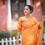 Amrutha Nair Instagram - Live life in warm yellows..... 🧡🧡 Saree @brand_nithara_ MUA @blushingtone_beauty_salon Pic @syam_muralee_photography Accessories @storybox.jewels Thiruvananthapuram, Kerala, India