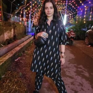 Angana Roy Instagram - Here's a picture of light emanating from the back of my head. And a series of other pictures where I stole @ayan.bhattacharjee_ 's new co-ord set designed by @elizabhowmik .

Haha.😎

#fridaymood #friday #ootn #evening #october #coordset #blacklove #designerwear #nightsky #durgapuja2022 #igtravel #taki #ethnicwear #ethnicjewellery #hairstyles #roadslikethese #lights #fairylights #lovefromA