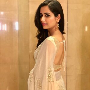 Ashika Ranganath Instagram - Wearing this beautiful saree by @brundagowda1912 💕 premier night! #Latergram #thayigethakkamaga
