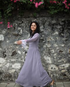 Namita Krishnamurthy Instagram - Purple haze. 💜

Outfit: @studio_l_by_lini
📸: @sat_narain 

#curls #morningvibes #bythebeach