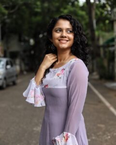 Namita Krishnamurthy Instagram - Purple haze. 💜

Outfit: @studio_l_by_lini
📸: @sat_narain 

#curls #morningvibes #bythebeach