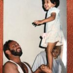 Neetha Ashok Instagram - Helping Appa with his Home workout since 1993 🤭🤣 I have no idea what @mateacher97 is doing in the background 😂 looks so funny all wrapped up in a bed sheet 😂 #quaratineworkout #daddaughterduo Kota, Kundapura