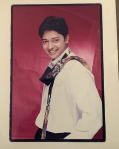 Shreyas Talpade Instagram - Throwback to the time when I thought a tie thrown as a scarf on a shirt looks sexy. Tie courtesy my big bro who had the money to buy it & was kind enough to lend it 😄😄. #ThrowbackThursday #FirstPhotoshoot