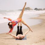 Aashka Goradia Instagram – Joy – Flying 
With मेरा @ibrentgoble ❤️
.
.
Photographer by beautiful @eli_smitt 
.
.
.
#acroyoga #acrofun #beachlife