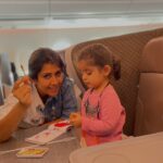 Ankita Bhargava Patel Instagram - Travelling with a toddler in a long-ish flight ! ✈️ Herez what All i did- ➡️I prepared a busy bag full of some new and some old activities. ➡️The evergreen Magnetic scribble board is a life saver. ➡️Got a new pop up book for the surprise element. ➡️Crayons,Stickers,Stamps and a drawing/colouring book are a must. ➡️We made Some pasta bracelets too. ➡️Her first official screen time happened on this flight! ➡️She got amused with the whole idea of using headphones. However after 15 mins she didnt care much about what was going on on the screen. ➡️I made a small suitcase with extra set of clothes for both Mehr and myself. ➡️Her fav doll and fav blanket to give her company. ➡️The flight was fairly empty so she walked around and explored the entire aircraft. ➡️I made sure i gave her her fav snacks to munch on and sips of water while take off and landing to help ear pressure. ➡️Pre ordered a kids veg meal while booking our tickets. ➡️She feeds herself so it was fairly easy for me on flight. ➡️She got comfy with eating slightly spicy foods on this trip. ➡️Kept her well hydrated thru the flight. ➡️I showed her ‘Happy Feet’ as her 1st film also cos we were about to visit penguins in Singapore so that she cud relate to them better. ➡️She also interacted with a senior couple sitting behind us who were amazed at how much she talks! ➡️Lots of cuddles and Loving too ! ➡️Little nap too Over all both the journeys to and fro were as smooth as butter ❤️ P.S - Plz make sure all the vaccinations of your child are up to date.I got Mehr her Influenza shot a few days before travelling.