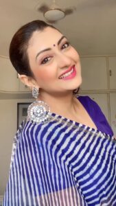Juhi Parmar Instagram - A little bit of fun, my favourite outfit, the traditional sari.  What else could one ask for?  #DropTheEarring #bollywood #reels #reel #reelinstagram