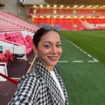 Madhurima Roy Instagram - Live from Anfield❤️ .. A day I dreamt of, joked with my friends, about being there someday, right there with my favourite team playing, soaking in that atmosphere, the dressing room, everything about it, was so magical. I still can’t believe I made it here. This is Anfield, and “You’ll never walk alone” A match to be witnessed live slowly but surely 🤞 Bucket list. Check ✅ Continuing to dream 💭 ❤️ .. #ynwa #liverpoolfc #fangirling Anfield, Liverpool