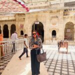 Munmun Dutta Instagram - Last year in May , while visiting Bikaner for an event, I and my team had the divine opportunity to visit Karni Mata temple in Deshnoke 🙏🏻 The temple is dedicated to Karni Mata, who the locals believe is an incarnation of Goddess Durga, the protective Mother Goddess in Hindu religion. The Karni Mata Mandir is popular for being home to over 25,000 rats that inhabit and freely meander around the temple complex. People from different corners of India and abroad come to witness this astounding spectacle and also bring milk, sweets and other offerings for these sacred beings. This has to be one of the most unique experiences I have had 🙏🏻❤️ . #karnimata #karnimatatemple #rajasthan #munmundutta #divineenergy #templesofindia #hinduism #hindutemple Karni Mata Temple, Deshnok, Bikaner, Rajasthan