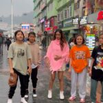 Nia Sharma Instagram - A no-traffic Road … Walked down this beautiful quaint road in the middle of Gangtok.. Bought this cute pink poncho…met some cute lil girls.. danced.. had a Mai Tai at Dragon 🐉 wok .. and everyone kind of knew my name so never felt as if it was a new territory❤️✌️ To such Sweet times…..💕 MG Marg, Gangtok