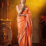 Sana Sayyad Instagram - NAVRATRI:- DAY 7 featuring @sana_sayyad29 as the Modern Indian Goddess where she represents the color ORANGE 🧡 . Shoot Concept & Designed By:- @nehaadhvikmahajan @bridalsbynam . 💄MUA , Hair & Styling :- @nehaadhvikmahajan . 🥻Saree :- @kankatala_ . 💍Jewelery :- @pooja_diamond . 🎥:- @abhay_r_kirti . Makeup :- @maybelline . Managed By :- @allboutcommunication . #sanasayyad #makeup #ootd #nehaadhvikmahajan #makeupbyme💄 #nammakeovers #bride #to #be #bridal #look #bridalmakeupartist #destinationweddingmakeupartist #weddingmakeup #hair #hairstyling #nammakeovers #bollywood #television #makeupartist #mumbai #traveller #all #over #the #globe