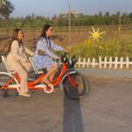 Tanya Sharma Instagram - Sunny 🌞 chill day @sula_vineyards ft 2 clumsy women 👭🏻🤦‍♀️ SWIPE RIGHT to witness our cycling skills 🙄 #tanyasharma #instgood #girlstrip #sulavineyards #sister #sharmasisters #nashik #fridayvibes The Source At Sula