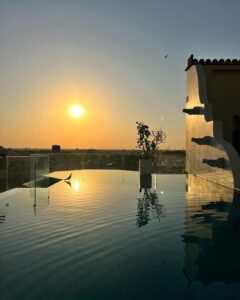 Aahana Kumra Instagram - Sunsets and pools 🌸🌞🫶🏜️🐫🥂🦚👙🌊🏝️🐚
.
.
.
📍 @narendra.bhawan.bikaner 
.
.
#thursday #thurdaythrowback #throwbackthursday #thursdaymotivation #getaway #swimsuit #sunset #pool #poolside #nofilter #sunlover #sunshinegirl #aahanakumra #rajasthan #bikaner