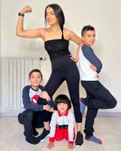 Celina Jaitly Instagram - Being a mother of twins plus one is learning about strengths you didn’t know you had and dealing with fears you didn’t know existed. 
There’s three to wash, three to dry; There’s three who argue, three who cry; There’s three to kiss, three to hug; and best of all, there’s three to love!
I dedicate today to all the frogs, spiders and grasshoppers my sons brought me as a gift to adopt… Proudly a mom of twins plus one!!
@winstonjhaag ❤️🧿 @viraajjhaag ♥️🧿 @arthurjhaag ♥️🧿

Thank you @haag.peter for the collaboration on the football team and the photo 😂

#twinsplusone #twins #celinajaitly #celinajaitley #haagbrothers #momlife #fitmom #momofboys #bollywood #iphonephotography