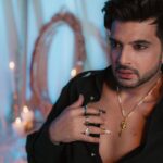Karan Kundrra Instagram - Unrestrained. Like the God of Poseidon. Today, came out to play. Concept: @appu.rentlyblunt @tgbtroop Shot by: @that.nikhil @dotstudiosmumbai Styled by: @shreeum #StyledByTGB Style team : @anushakala Rings: @nenikaar @amamajewels Shoes: @jeetinder_sandhu Shirt: @siddhantagrawallabel (reworked) Pants: @dromodaa (reworked) Necklace: @hars_bijoux