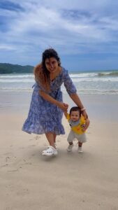 Sameera Sherief Instagram - Quality time with my son. Vacation appropriate, looking stylish as I’m wearing SSXMB. Below are the details of the dress. Get your hands on it, if u are a mom-to-be or a new mom. 

*Eden*
Eden is high on both style quotient and sex appeal! The top half of Eden is designed as a wrap dress allowing you to choose how deep you’d like your neck line, from conservative to very sexy, you lead the way. Ribbons attached to the sides get tied at the back to give you shape and hold the flap down.

The bottom gives the impression of a wrap dress but isn’t. The outfit has a ruffled asymmetric helm line that adds to the style. Ties come together at the back to give shape. Pockets on both sides add extra functionality. 

The unique SM X MB design includes a cross-over inner neck pattern to access your breasts with compete ease and a fully integrated flap that helps you have 100% privacy as you nurse.