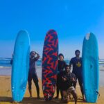 Aditi Balan Instagram - Never bored on a surfboard. Photographer @vanarosa11 Surf instructor @vicky_surfer @oceandelightsurfschool_india Caption credits @arjunradhakrishnan