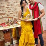 Akansha Chamola Instagram - Behind every husband who thinks he wears the pants ….. is a wife who told him which pair to wear …. quite literal in our case 🥰🥰🥰🥰 . . . . . . . . . . . . . . . . . . . . . . . . . #karwachauth #karwachauthspecial #indianfestivewear #indiansaree #gold #couplegoals #marriedcouple #instacouple #instacute #instalove #instafashion #instafam #aboutlastnight #desi #indianfestival #couplegram #funnycaptions #instamood