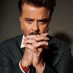 Anil Kapoor Instagram - Coming for you, Bigg Boss for #TheNightManager @disneyplushotstar Photographer:@vaishnavpraveen @thehouseofpixels Stylist: @kshitijkankaria And @saloniparekh__ Hairstylist: @raskarjaipal @whynot_byzeeba Makeup Artist: @deepakchauhanartist Disclaimer : Smoking is injurious to health.