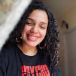 Ann Augustine Instagram – That Feeling good bout myself ‘PSYCHO-tee’ smile!

#psycho#favourite#psychotee#curls#curlyhair#jewelleryaddict#goodhairday#silverlove#coffeelover#staysafe#beachlover#home#favtees#feelinggood#artlover