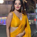 Antara Biswas Instagram - So Many Songs In Mind On This Yellow Saree… You Suggest Me For My next #reel 🤷‍♀️ #beqaboo #tonight at 9pm Mua : @makeupbyshahrooq 📸: @deepakpathak663 Film City