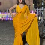 Antara Biswas Instagram - So Many Songs In Mind On This Yellow Saree… You Suggest Me For My next #reel 🤷‍♀️ #beqaboo #tonight at 9pm Mua : @makeupbyshahrooq 📸: @deepakpathak663 Film City