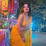 Antara Biswas Instagram - So Many Songs In Mind On This Yellow Saree… You Suggest Me For My next #reel 🤷‍♀️ #beqaboo #tonight at 9pm Mua : @makeupbyshahrooq 📸: @deepakpathak663 Film City