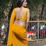 Antara Biswas Instagram - So Many Songs In Mind On This Yellow Saree… You Suggest Me For My next #reel 🤷‍♀️ #beqaboo #tonight at 9pm Mua : @makeupbyshahrooq 📸: @deepakpathak663 Film City
